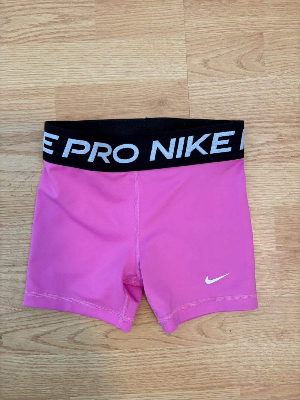 Nike Pink Athletic Compression Shorts with Black Waistband
